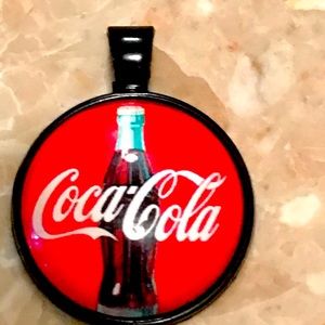 New Pair of Coca Cola pendant and ear pod holder